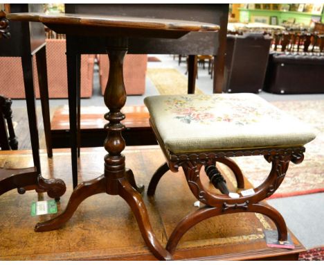A needlework stool on a carved mahogany frame together with a tilt top occasional table 