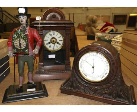A reproduction figural mantel timepiece, a carved oak mantel aneroid barometer, a striking mantle clock (3)