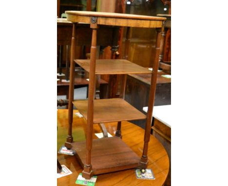 A Regency mahogany occasional table with three shelf stretchers 