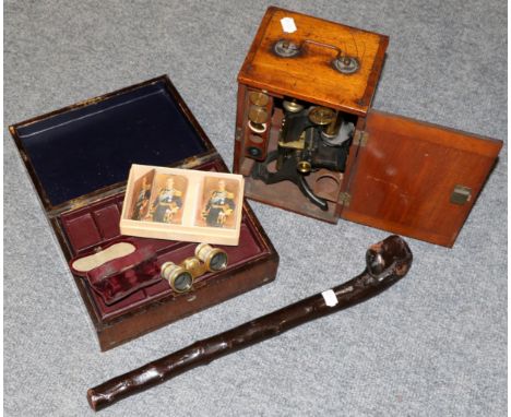 A mahogany cased microscope by J. Lucking, Birmingham, late 19th Century/early 20th Century; together with a Victorian rosewo