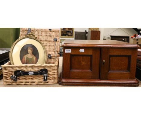 An early 20th century empty oak canteen with ivory label 'Manoah Rhodes & Sons Ltd', a painted over print and a small hamper 