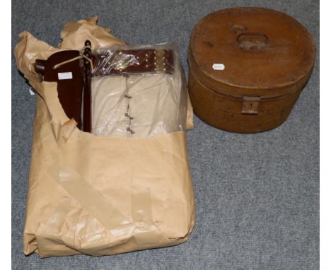 A mink fur jacket, metal hat box, box of linen and a camel stool 