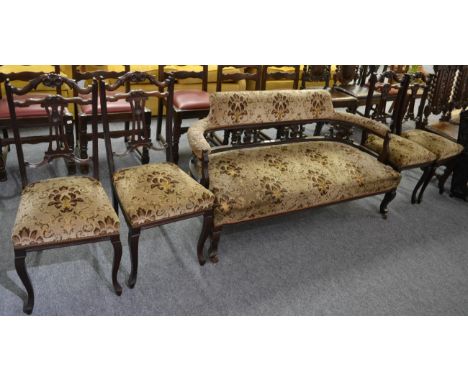 A five piece mahogany framed parlour suite including four chairs and a sofa 