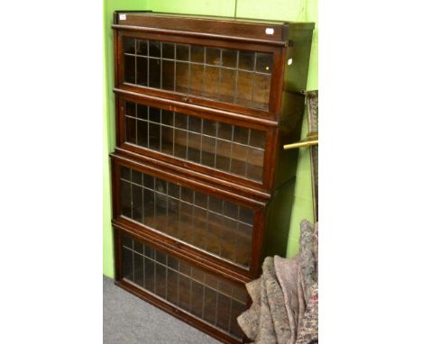 A globe-wernike oak four tier sectional bookcase 