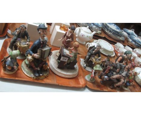 Two trays of continental figurines and figure groups, tramp on bench, Hummel figurines etc.(B.P. 24% incl. VAT)
