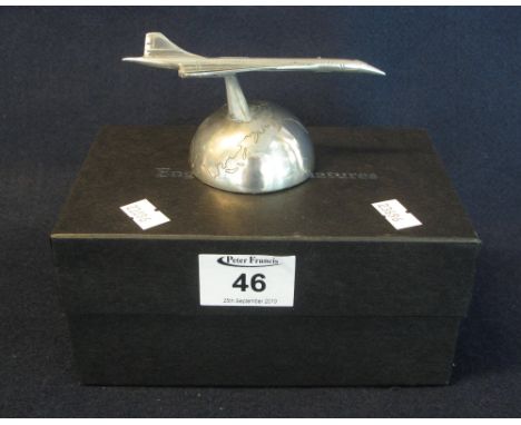 English miniatures pewter model of Concorde on half globe base. (B.P. 24% incl. VAT)