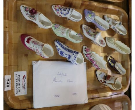 A tray of fine bone china miniature shoes by Aynsley, Worcester, Royale Stratford etc. With certificates. (B.P. 24% incl. VAT