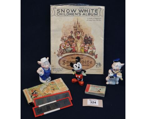 Walt Disney Snow White children's album, a complete story of the three little pigs on 24 coloured lantern slides. (6)(B.P. 24