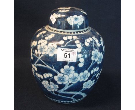 Chinese porcelain prunus blossom design baluster shaped ginger jar and cover, having four character Kangxi mark to the base. 