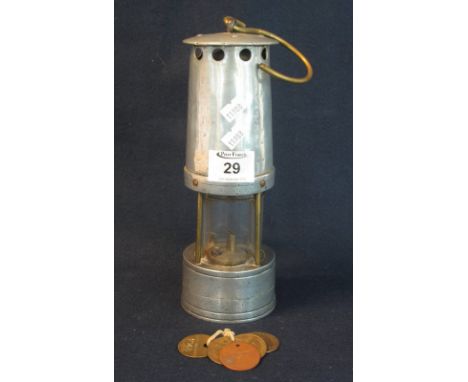 Original aluminium miner's safety lamp, together with a group of brass miner's tallies for NCB area no. 4 South Western Divis