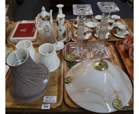 Two trays of items to include; Laura Ashley lamp shades, pair of glass fluted column candlesticks, marbled glass light shade 