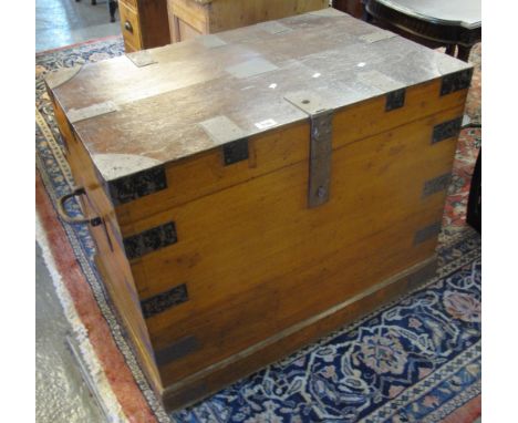 19th century oak, metal banded travelling trunk with large metal loop carrying handles.(B.P. 24% incl. VAT)