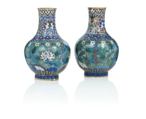 A pair of Chinese cloisonné-enamel baluster vasesDecorated with flowers on a blue ground and with ruyi head band at the neck,