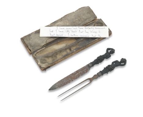 A silver-mounted knife and fork setProbably Dutch, 17th century  With carved figural ebony handles, engraved silver ferrules 