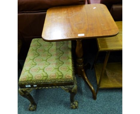 A Victorian walnut tilt-top tripod table 51cm square and a walnut and parcel gilt dressing stool with carved frame, cabriole 