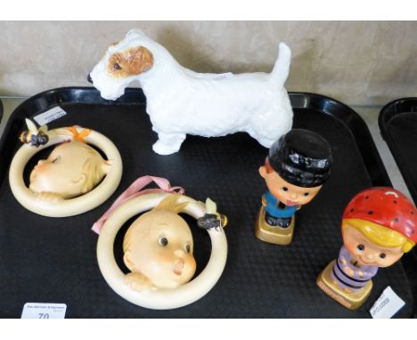 A Royal Doulton Scottie dog together with a pair of nodding figures and a pair of Hummel nursery wall hangings