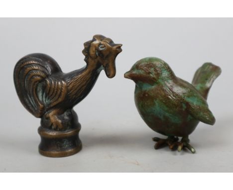 2 cast bronze figures of birds.one marked by Ilana Goor