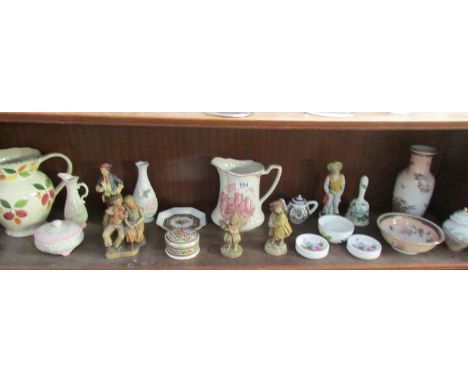 A shelf of assorted china