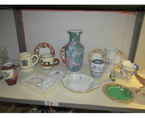 A shelf of good assorted china items including vases, tankards etc.