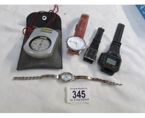 4 wrist watches and a compass