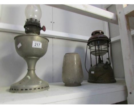 An oil lamp and a Tilley lamp