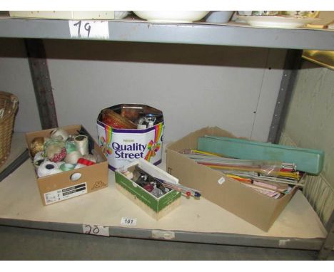 A shelf of knitting and sewing items