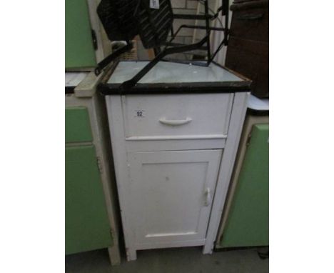 A vintage kitchen cabinet