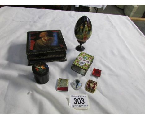 A lacquered box with painted portrait A/f, a lacquered pill box, A lacquered egg, a metal matchbox holder and quantity of bad