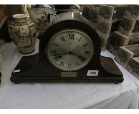 A mantel clock with presentation plaque for Lady Manners School 1950