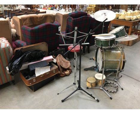 A Premier bass, snare and tom drums and bongo drums with cymbals, stands etc.