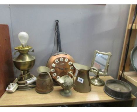 A quantity of brass ware including jugs, lamp etc.