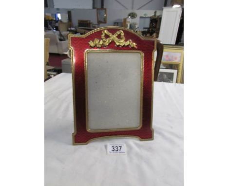 An enamel and gilt photo frame, (missing glass)