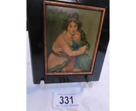 A small portrait of woman and child