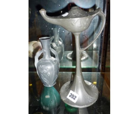 Art Nouveau pewter tall spirit lamp on stem, and a similar vase