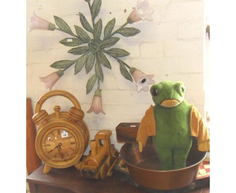 A wooden train and large wooden alarm-style clock, a floral wall light, frog soft toy, chess set in carved wooden case, and a