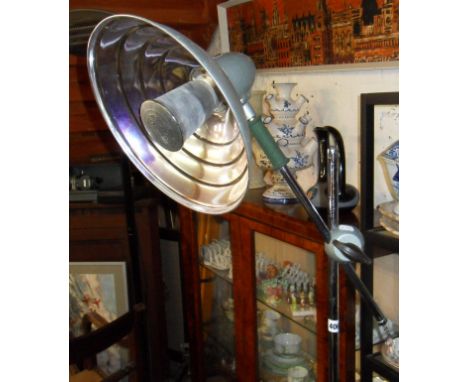 Industrial chrome & steel reflector standard lamp on tripod base with castors