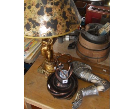 Gold-coloured cherub table lamp, Nemesis Now skeletal arm wall-hung candle-holder, and another lamp