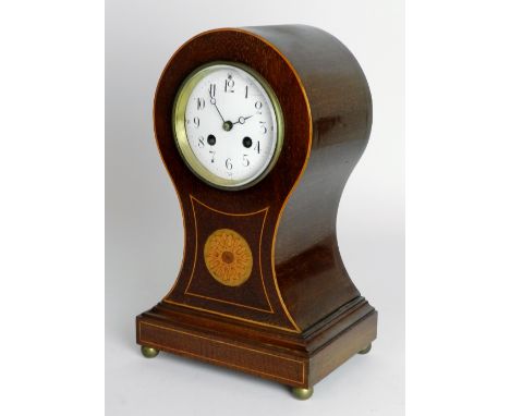 An Edwardian mahogany boxwood line strung eight day balloon shaped mantel clock, the 4 inch convex enamel white dial with rin