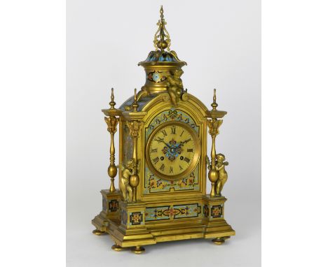 A late 19th / early 20th century French ormolu and champleve enamel architectural mantel clock, the 4 inch dial with ring of 