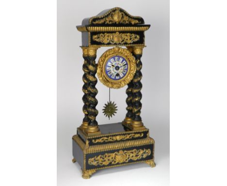 A 19th century ebonised portico type mantel timepiece with gilt metal mounts and 3 inch Sevres style porcelain dial with ring