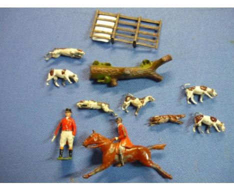 Britains painted lead figure hunting group comprising of huntsman, fence, log, hunt footman, hounds and fox (11) 