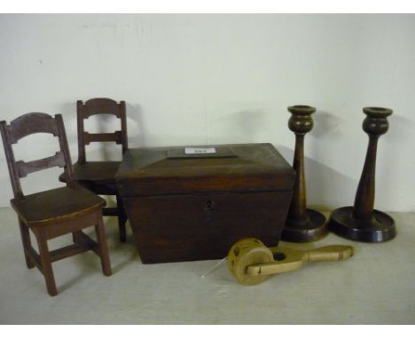 19th C rosewood two sectional tea caddy (A/F), a pair of early 20th C wooden candlesticks, a pair of miniature chairs and a S