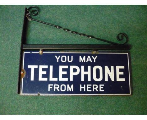 Double sided blue &amp; white enamel 'You May Telephone From Here' sign with later wall mounting bracket (56cm x 23cm) 
