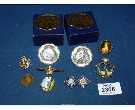A small quantity of costume jewellery including; Celtic brooches, scarf clasp, George VI brooch, Coalport mini plates, etc.