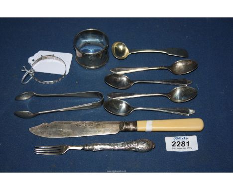 A quantity of silver including teaspoons, napkin ring, mustard spoon, sugar tongs, dessert fork, etc., hallmarks for Birmingh