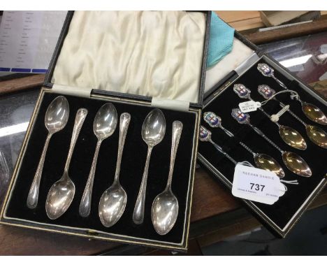 Six silver beaded old English pattern teaspoons in fitted case together with a set of six silver and enamel teaspoons in fitt