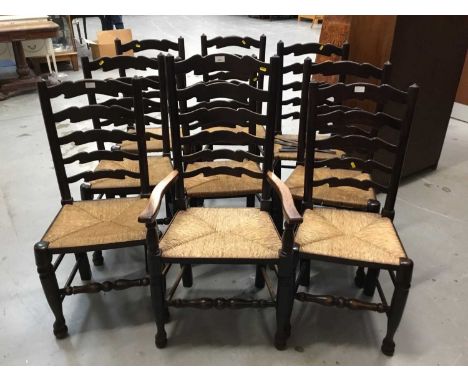 Set of nine antique -style ladder back chairs with rush seats comprising one elbow and eight standards and one associated elb