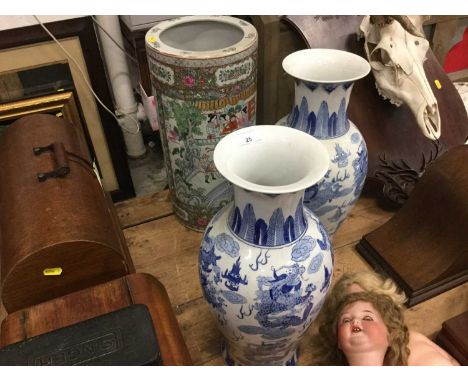 Pair of Chinese blue and white vases together with a Chinese stick stand (3)