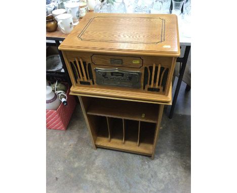 Classic Collector's Edition record player in light oak case and matching record cabinet