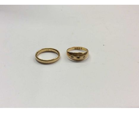 18ct gold wedding ring, size Q½  and an 18ct gold diamond gypsy ring (one stone missing), size RCondition report: Total weigh